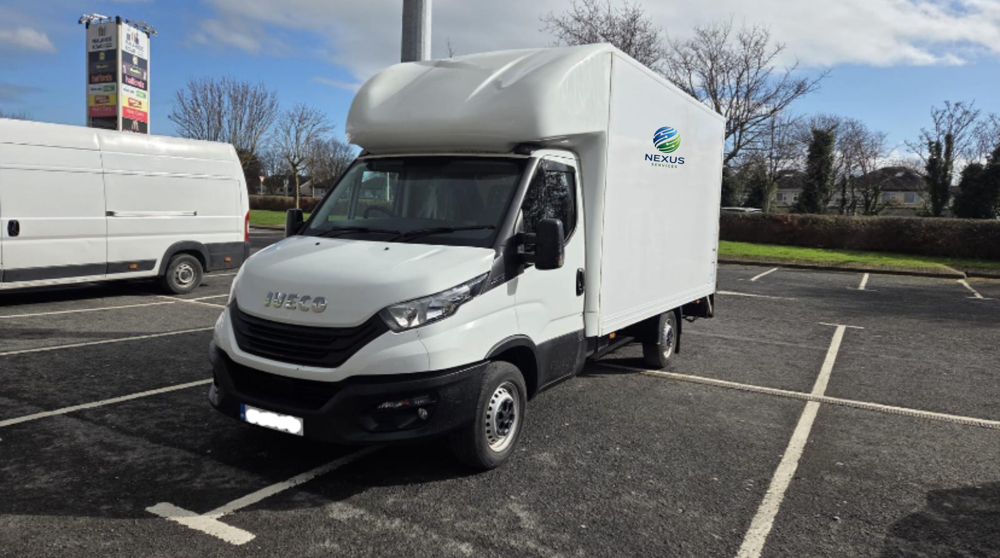 Branded Iveco Daily delivery van on Irish road